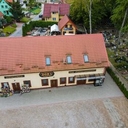 Dora Dom Przedpogrzebowy. Kwiaciarnia, Usługi Kamieniarskie, Nagrobki, Wystawa Pomników (parter) (Lidzbark Warmiński )